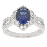 Blue sapphire sterling silver ring with accent stones, elegant jewelry for sophisticated style.
